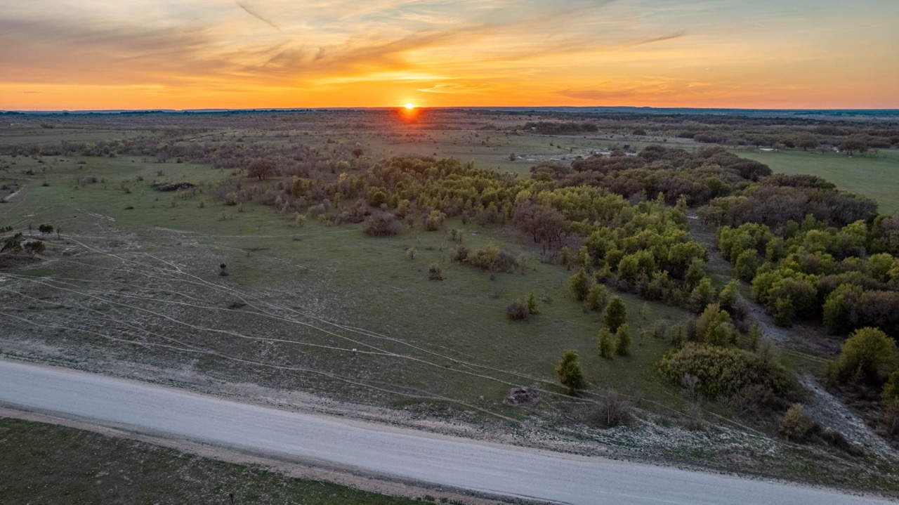 Aerial drone photography of ranch land and acreage at sunset, Central Texas